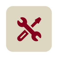 Red wrench and screwdriver icon.